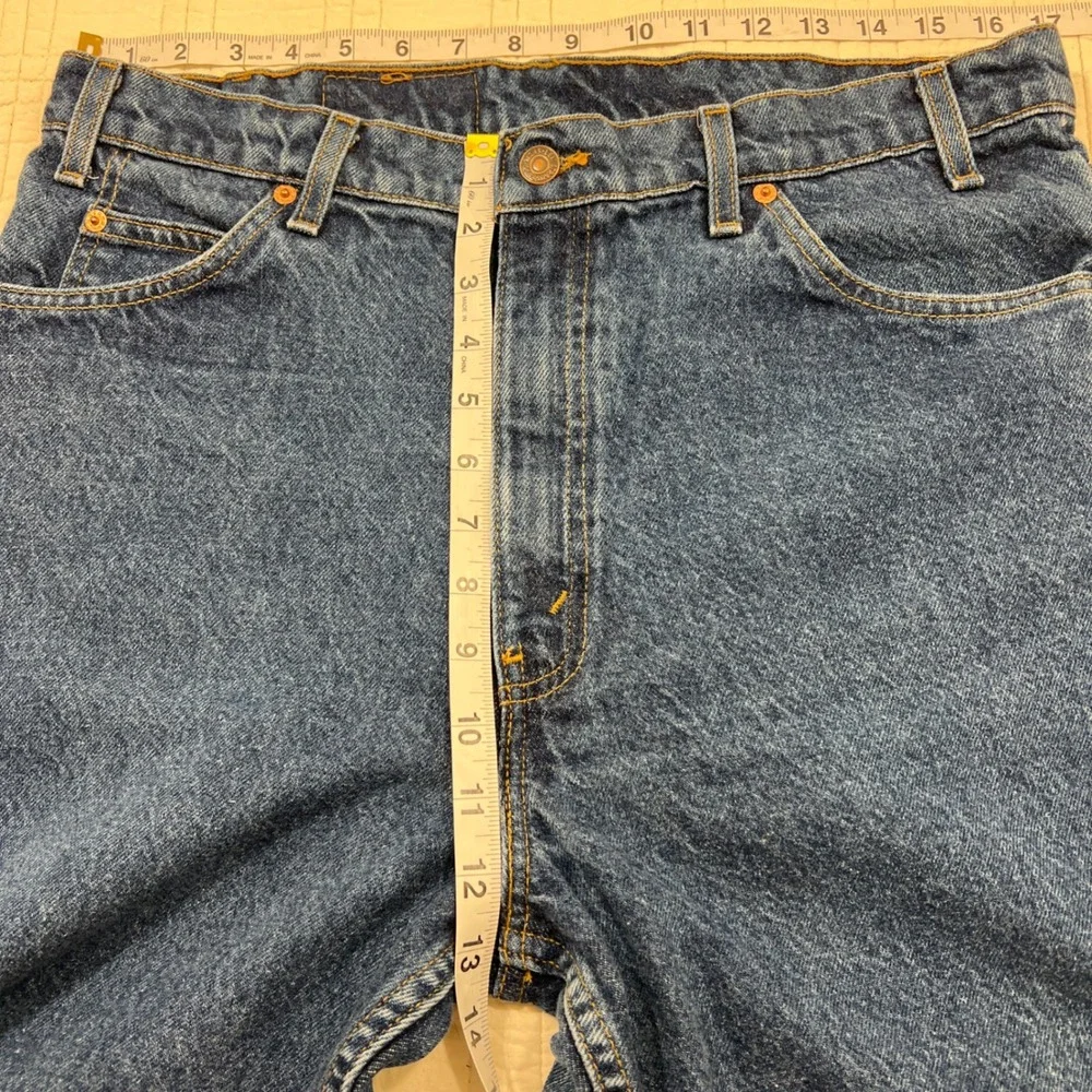 Vintage 90's Levis 550 Orange Tab Relaxed Fit Tapered Jeans 36x34 Medium Wash